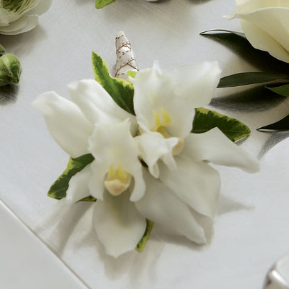 White Mini Cymbidium Boutonniere – FLOWERS & GIFTS BY ROBERTS, Pinetops NC